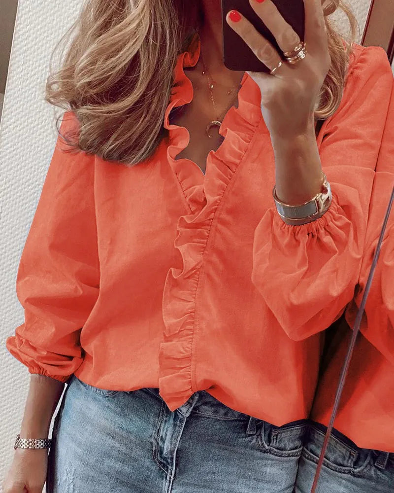 Blusa elegante de manga larga Maren